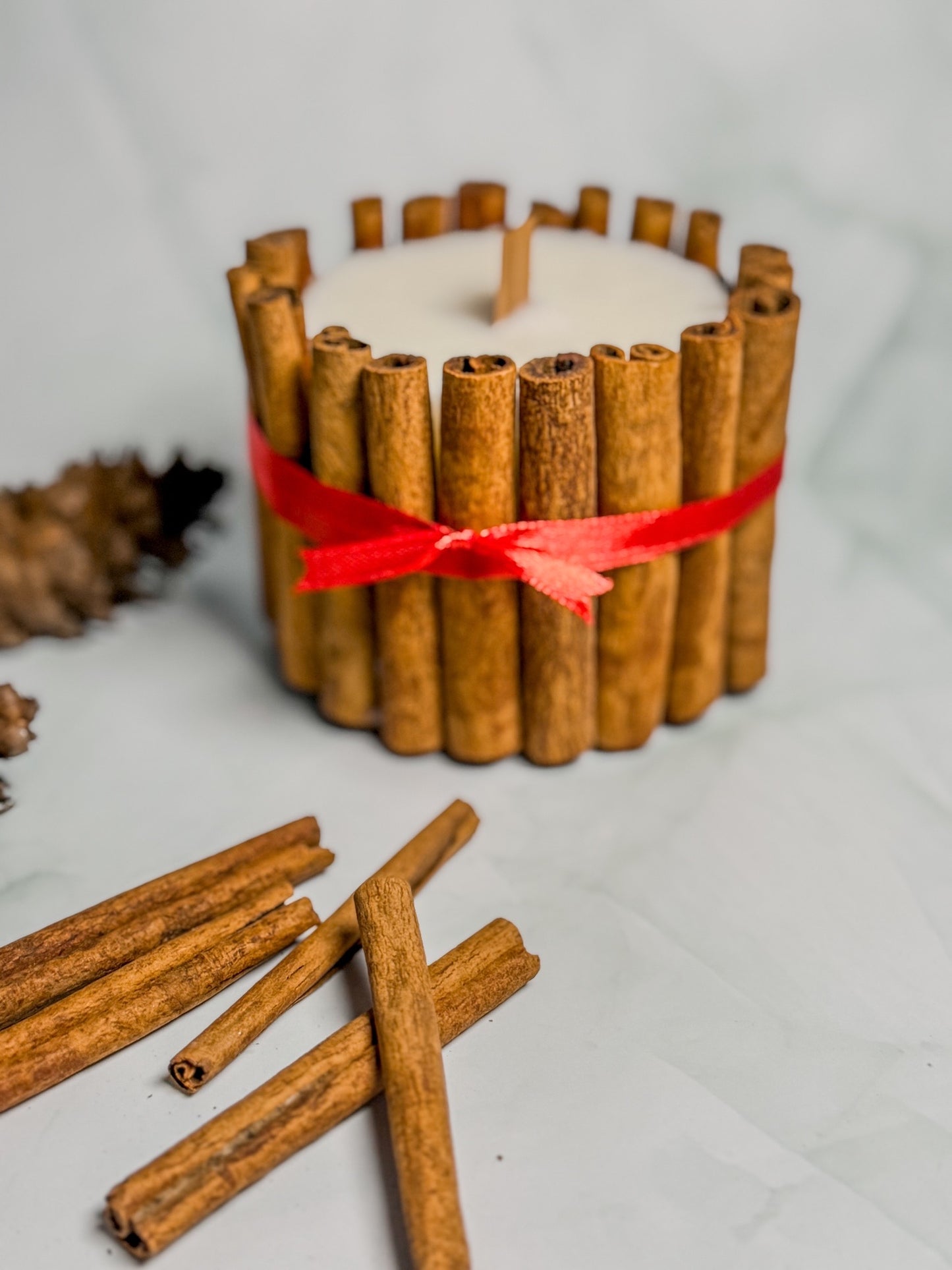 Vela com Paus de Canela